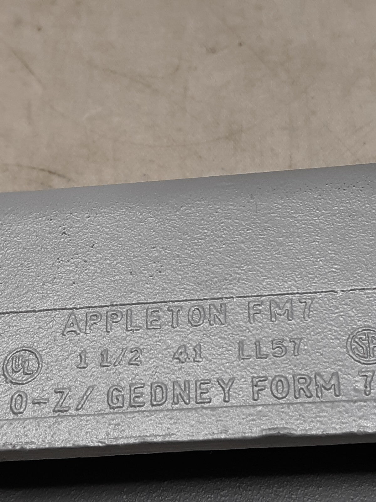 LL57 APPLETON MALLEABLE IRON CONDUIT BODY 1.5 INCH HUBS TYPE LL FORM 7