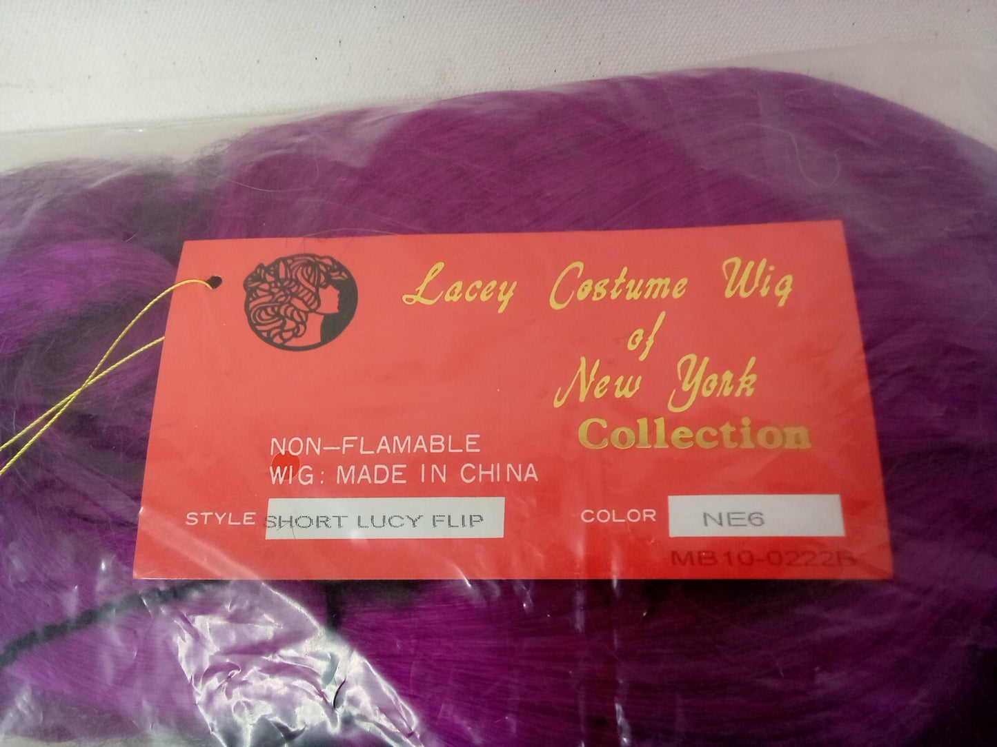 Lacey Costume Wig of New York Collection Style: Short Lucy Flip Color: NE6 Pink