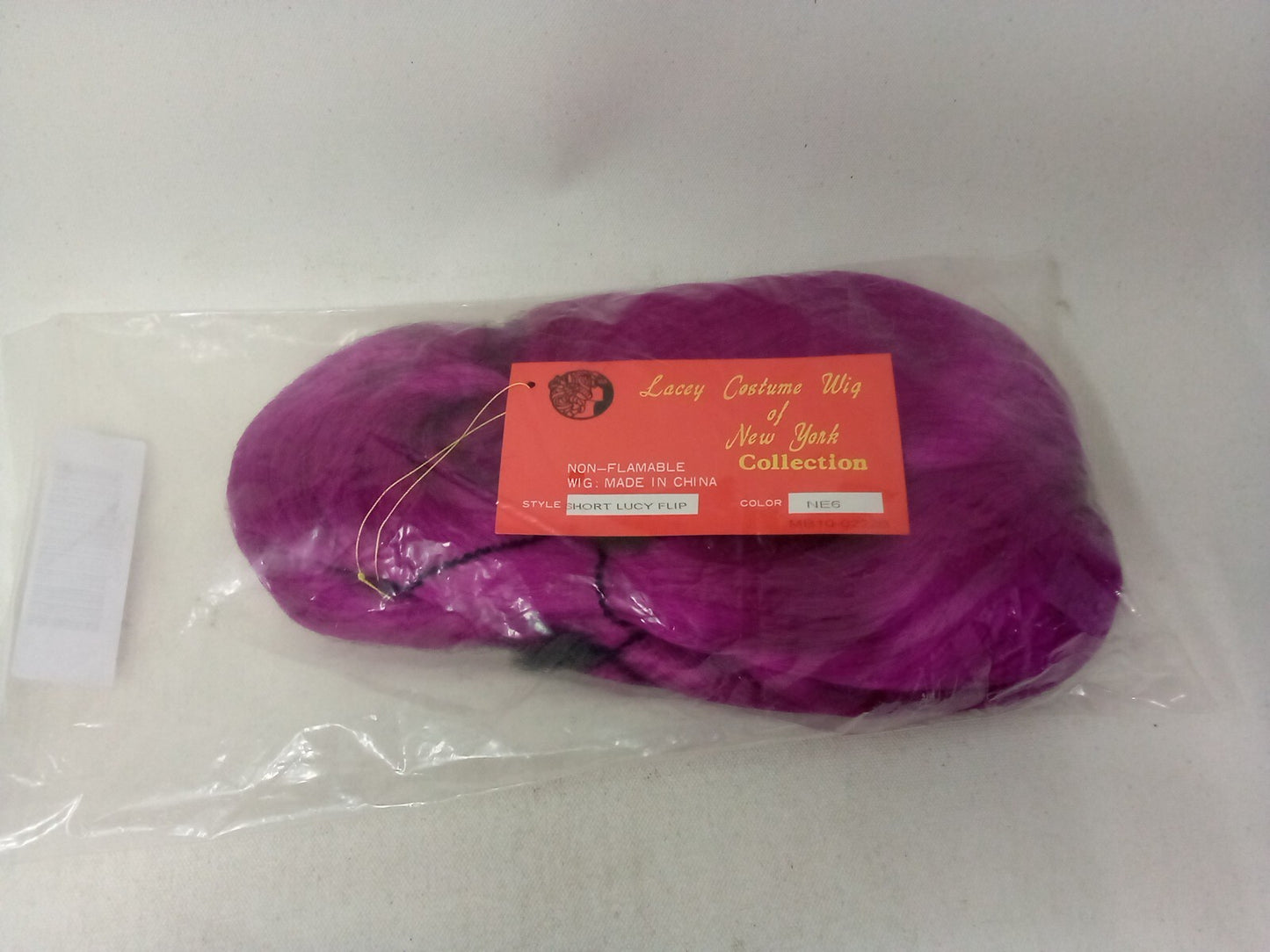 Lacey Costume Wig of New York Collection Style: Short Lucy Flip Color: NE6 Pink