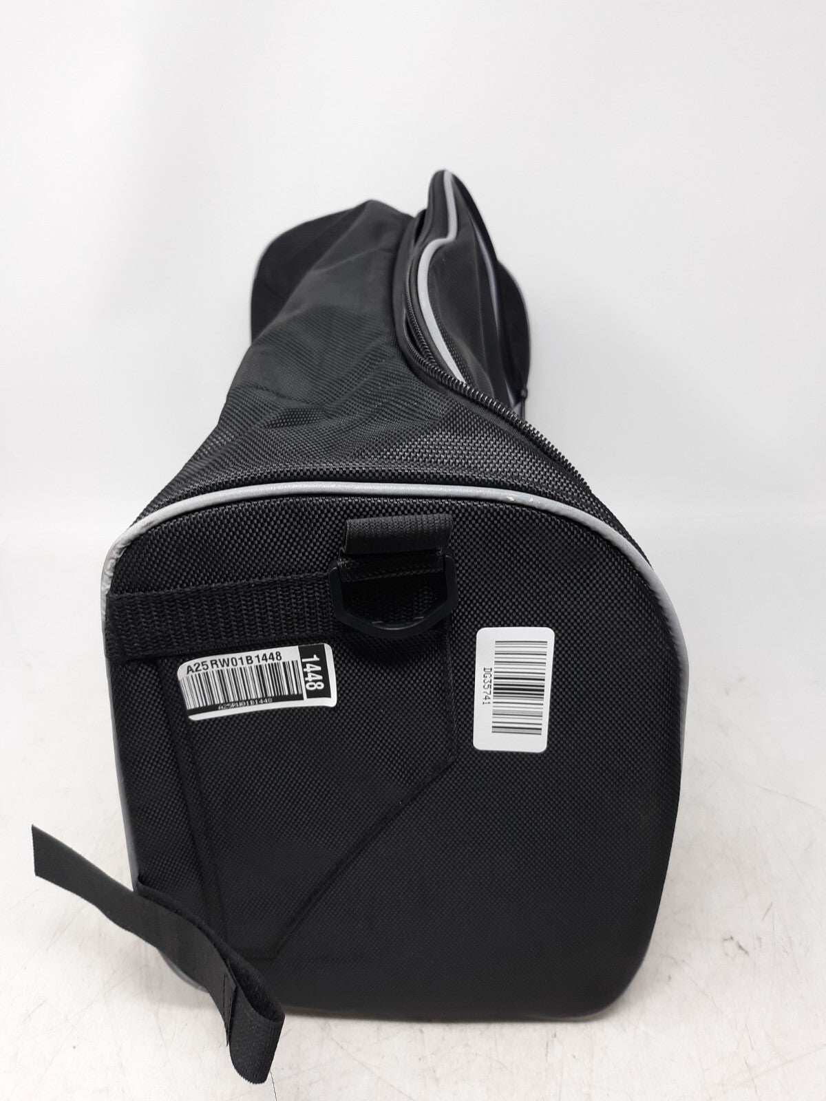 black travel bag with a zippered main compartment and mesh interior