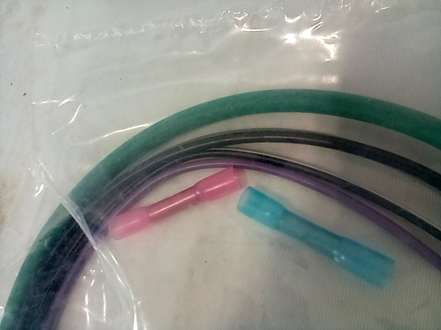 Multicolored wires electronic connector, purple, green and black