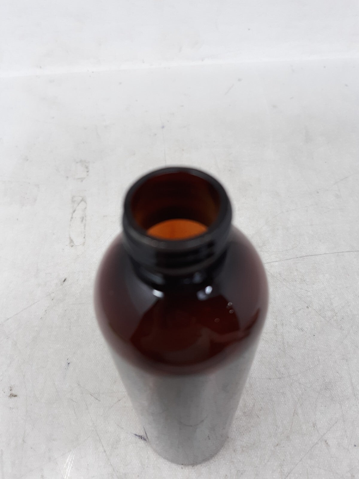 6 oz PET clear Cosmo Round Bottle with 20-410 neck finish- 1000/Case Brown