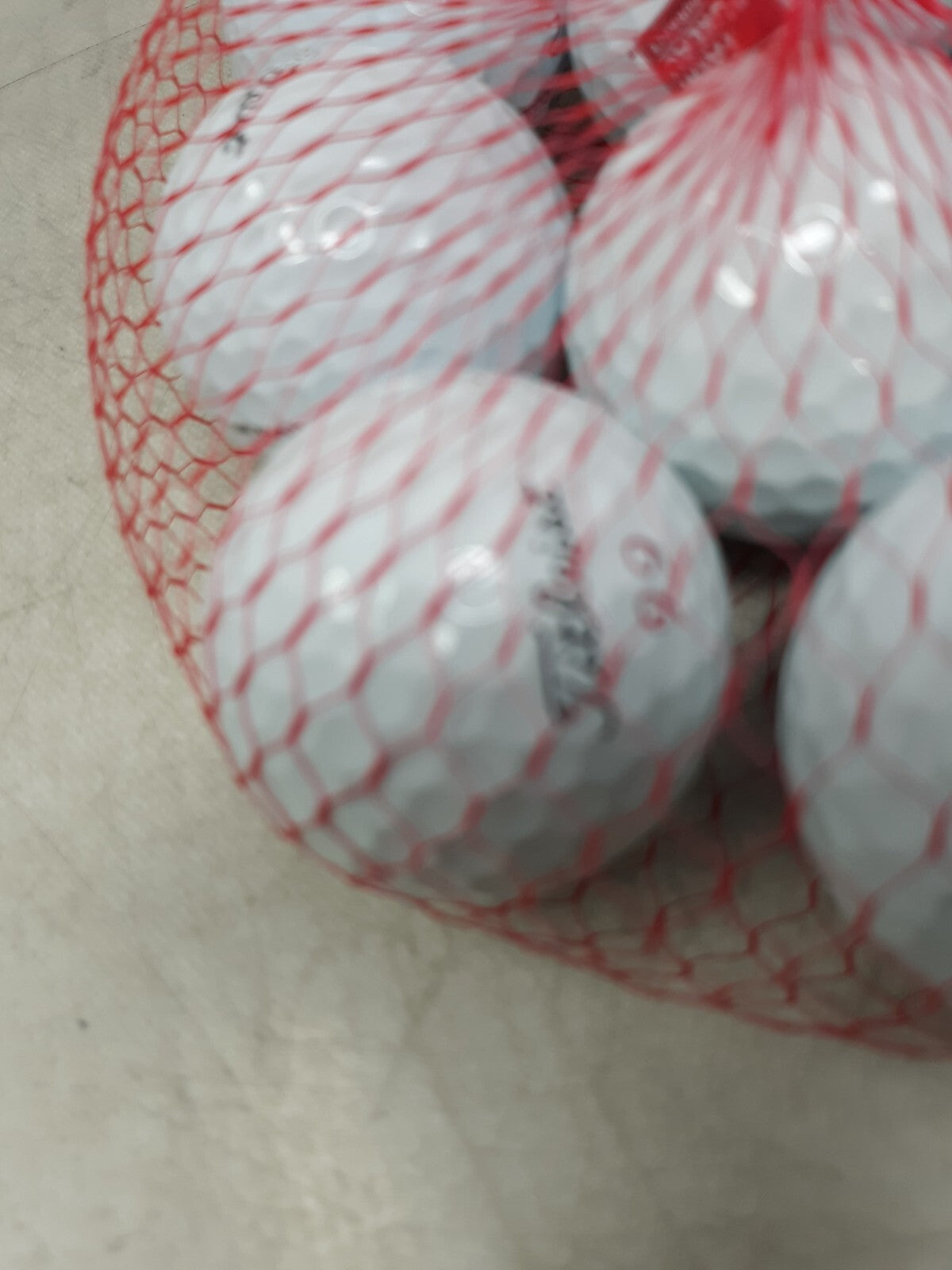 Titleist one dozen golf balls assorted.