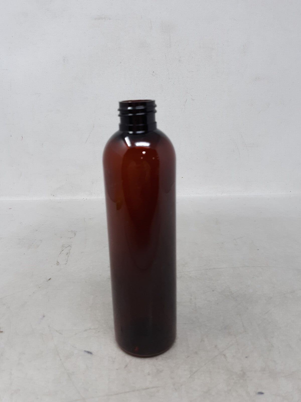 6 oz PET clear Cosmo Round Bottle with 20-410 neck finish- 1000/Case Brown