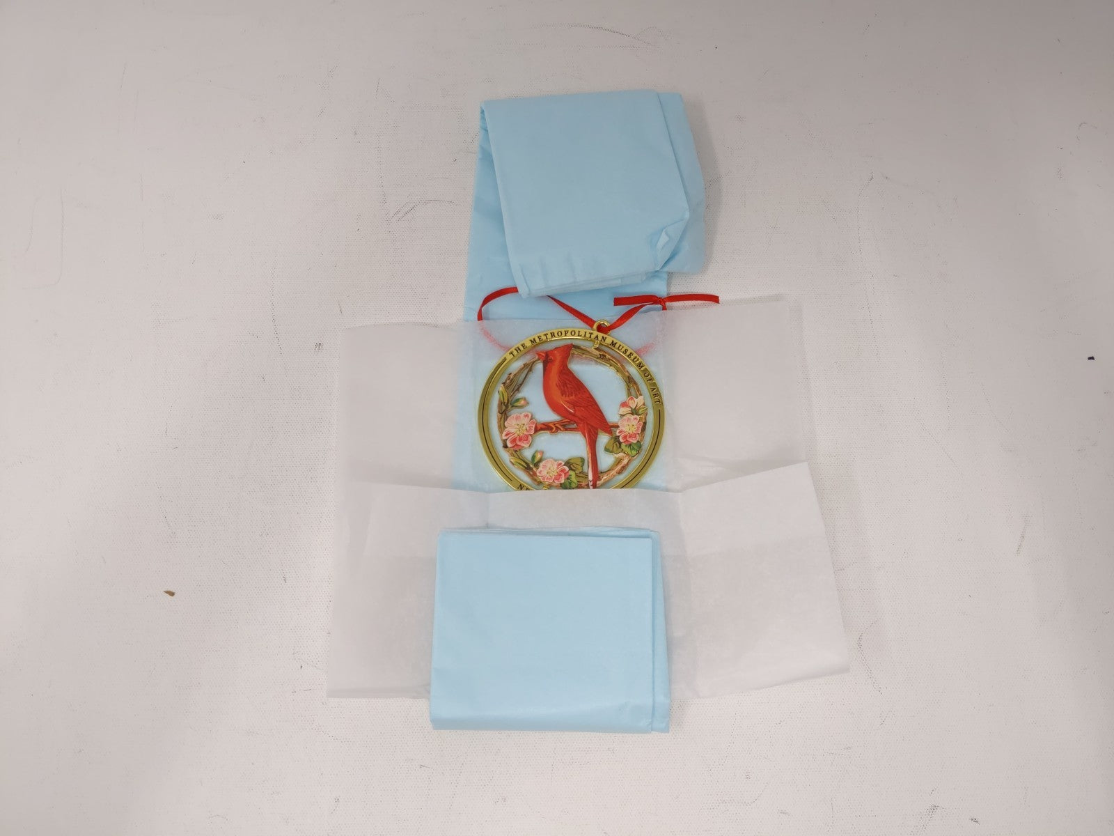 The Met  New York Cardinal Grosbeak Spinning Ornament