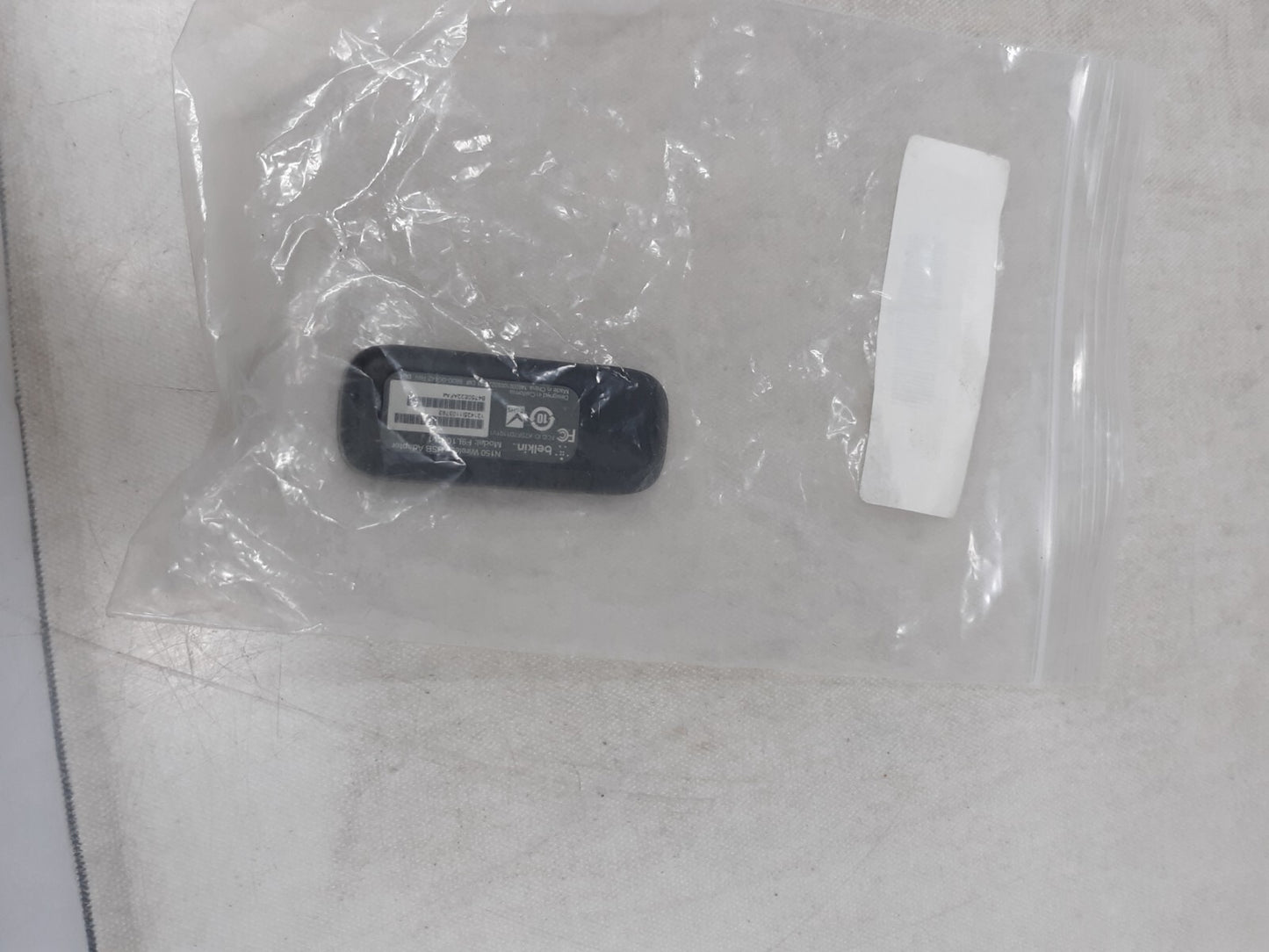 BELKIN N150 HIGH PERFORMANCE WIRELESS USB ADAPTER MODEL F9L1001V1  A1-1(4)