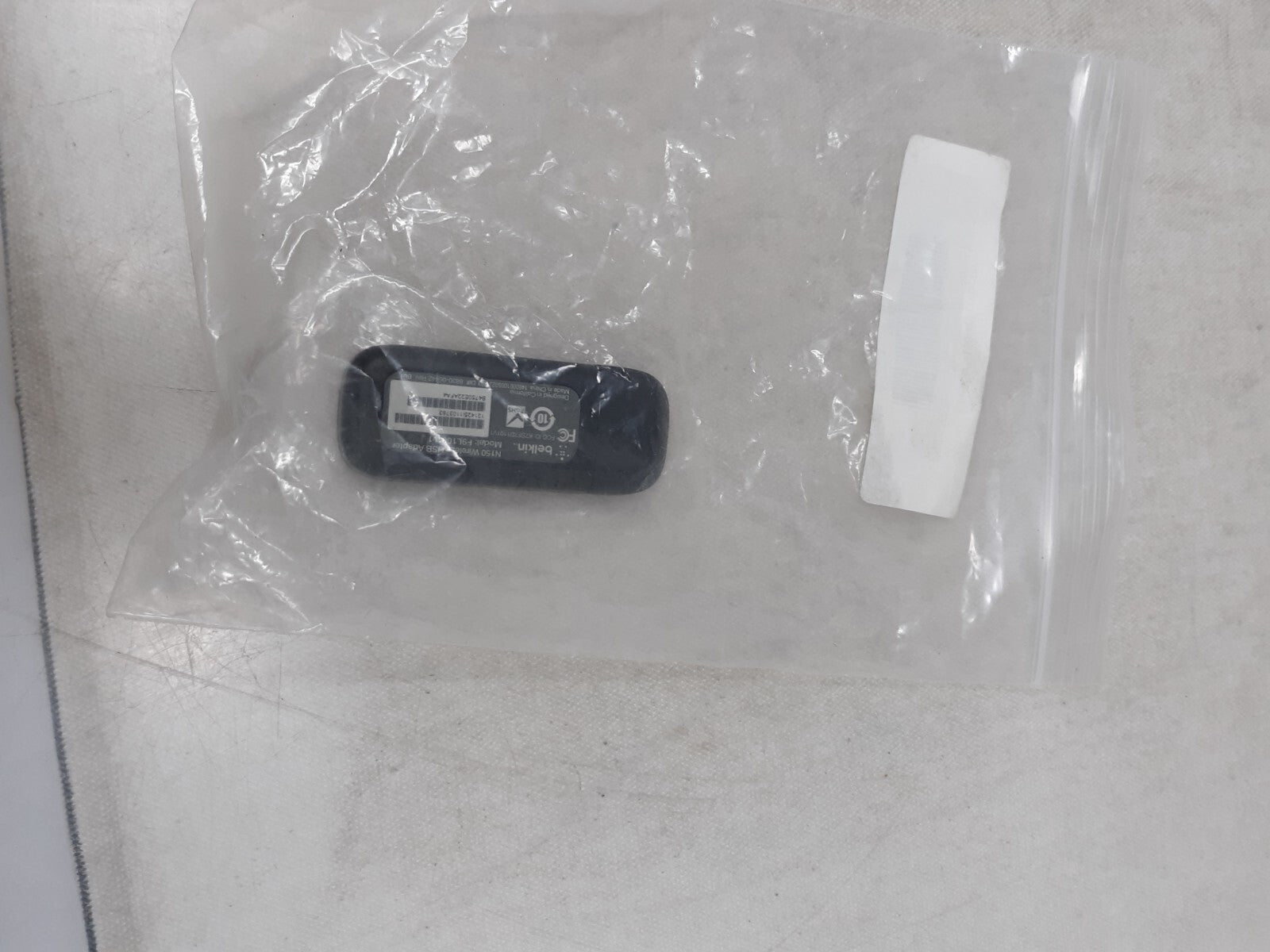 BELKIN N150 HIGH PERFORMANCE WIRELESS USB ADAPTER MODEL F9L1001V1  A1-1(4)