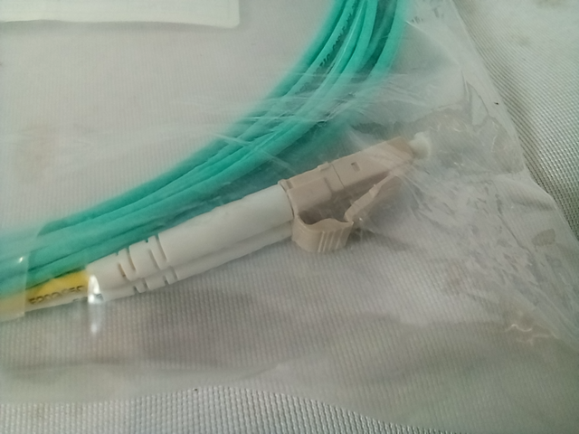 Flux light fiber optic patch cord, teal color