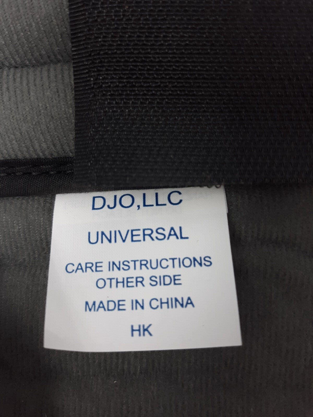 DJO Universal Leg Brace Adjustable Gray White & Black 19.5"